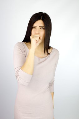 Sic woman coughing in studio clipart