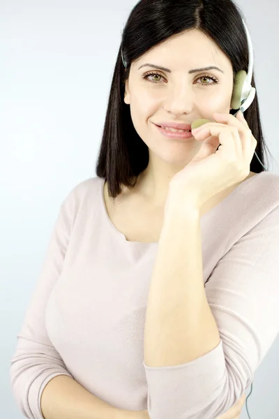 Sorridente fiducioso call center donna — Foto Stock