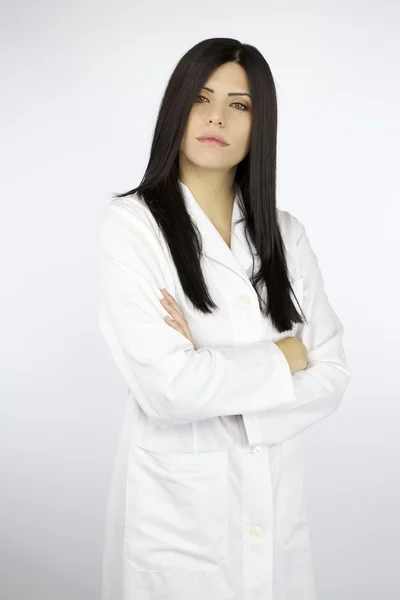 Serious confident female doctor looking — Stock Photo, Image