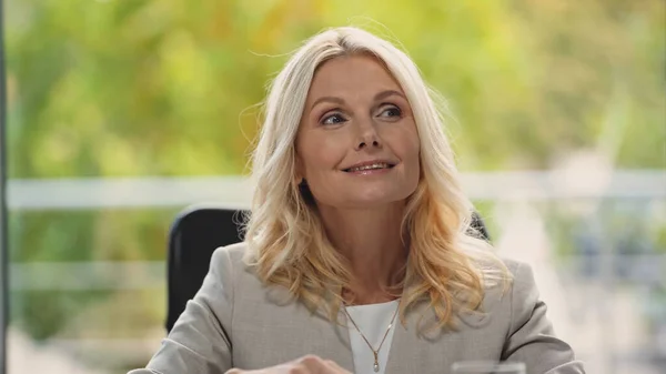 Blonde Middle Aged Businesswoman Smiling While Looking Away Office — Stock Photo, Image