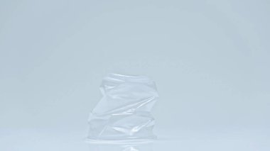 crumbled plastic cup isolated on gray with copy space, zero waste concept  clipart