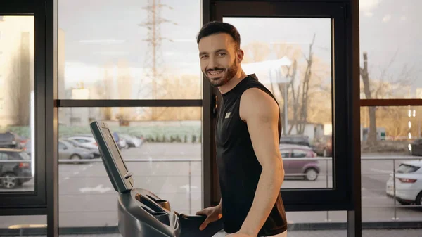 Smiling Sportsman Looking Camera While Training Treadmill Gym — Stock Photo, Image