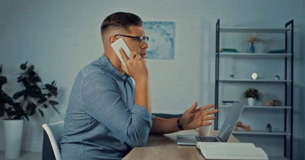 Side View Man Glasses Talking Smartphone While Working Remotely Home — 스톡 사진