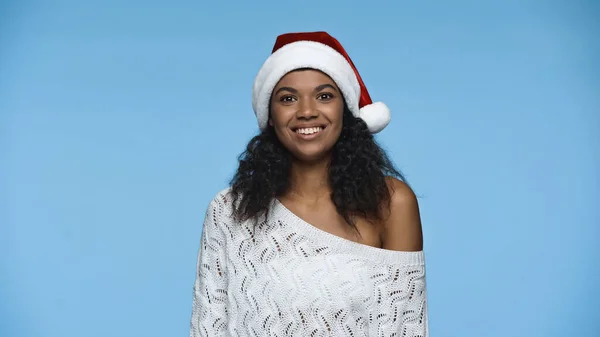 Happy African American Woman Santa Hat Looking Camera Isolated Blue — Foto de Stock