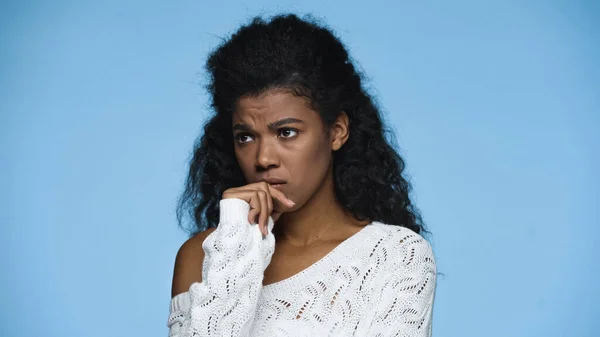 Worried African American Woman White Knitted Sweater Frowning Isolated Blue — Stockfoto