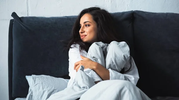 Awakened Pleased Young Woman Hugging Blanket Bedroom — ストック写真