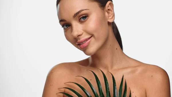 Joyful Young Woman Holding Green Palm Leaf Isolated White — Stockfoto