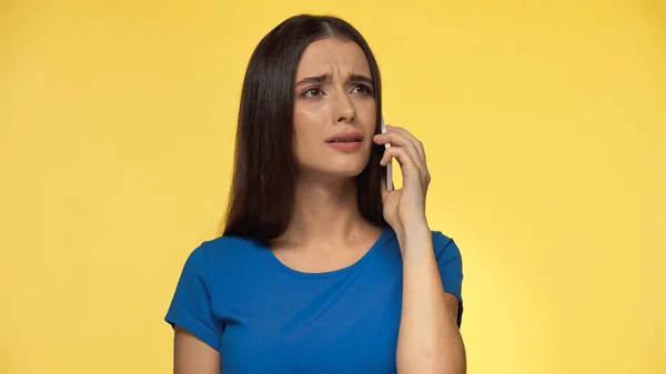 Young Brunette Woman Blue Shirt Talking Smartphone Isolated Yellow — Fotografia de Stock