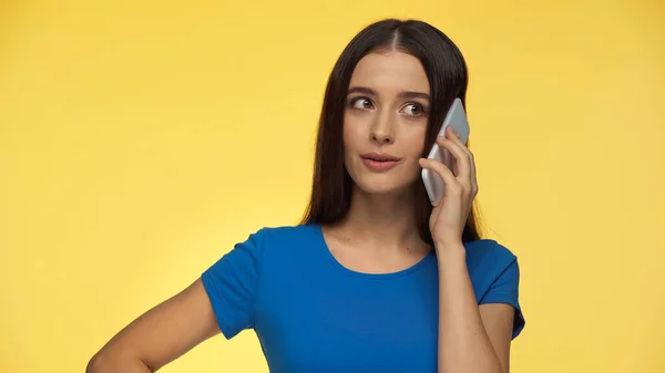 Young Brunette Woman Blue Shirt Talking Cellphone Isolated Yellow —  Fotos de Stock