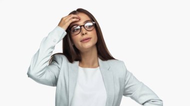 tired businesswoman in grey blazer and eyeglasses isolated on white