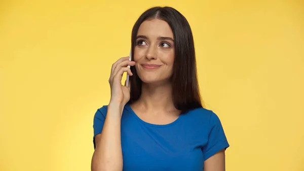 Cheerful Young Woman Smiling While Talking Smartphone Isolated Yellow — Foto Stock