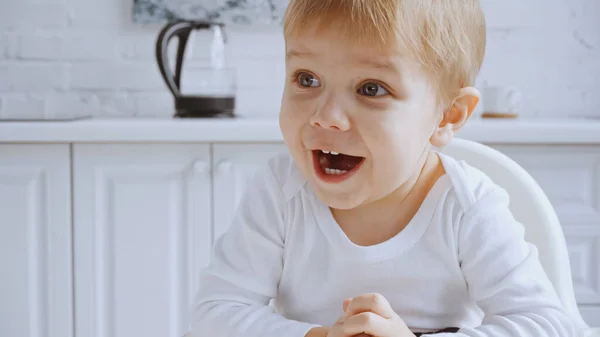 Excited Toddler Boy Opened Mouth Sitting Feeding Chair Home — Foto Stock