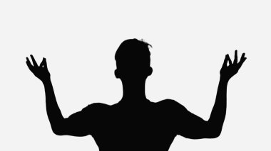 black silhouette of man meditating isolated on white clipart