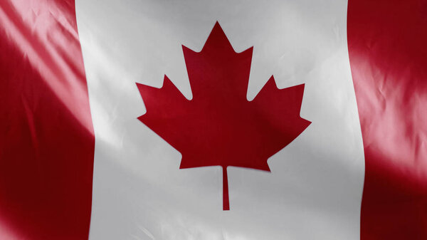 top view of national canadian flag with red maple leaf