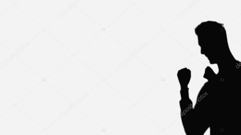 black silhouette of boxer training isolated on white with copy space