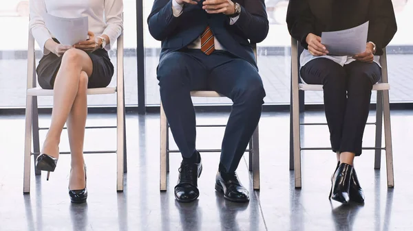 Partial view of business people waiting for job interview in office — Foto stock