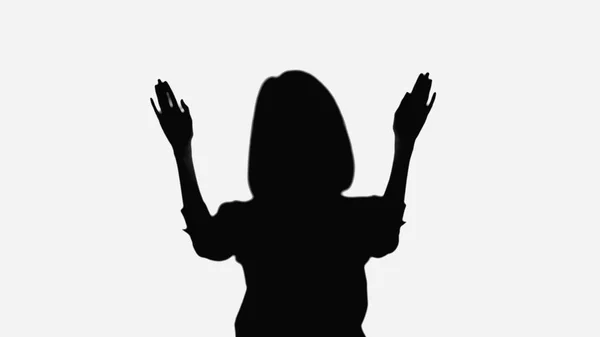 Silhouette of woman waving hands isolated on white — Foto stock