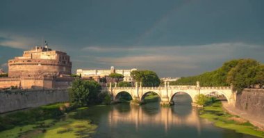 4K Timelapse view of a rainbow over roman bridge Castel Sant'Angelo, Rome Italy