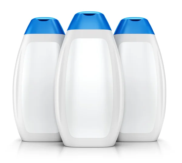 Three white plastic bottles of shampoo — Stock Photo, Image