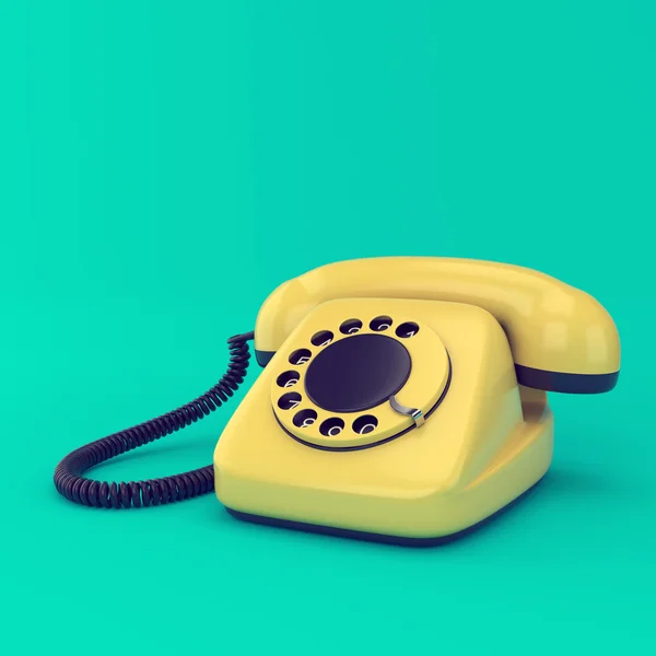 Желтый ретро телефон — стоковое фото