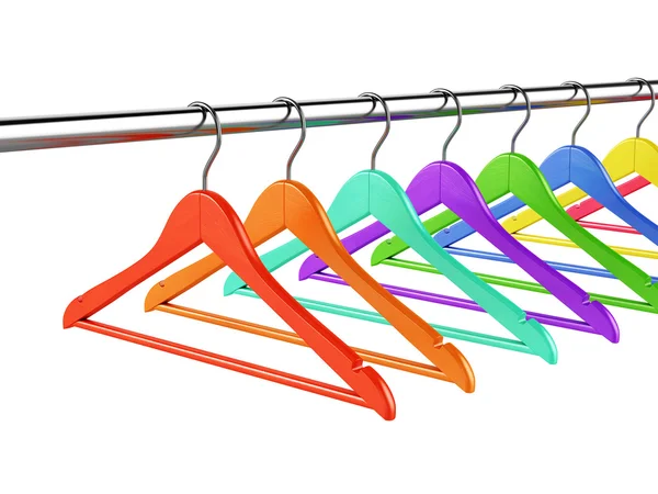 Colorful hangers on clothes rail — Stock Photo, Image