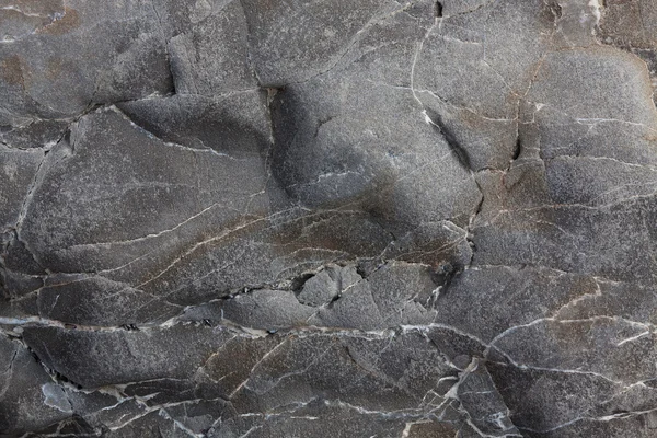 Pedra lisa cinza com rachaduras — Fotografia de Stock
