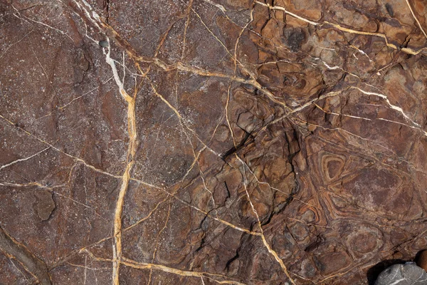 Brown stone with cracks and stains — Stock Photo, Image