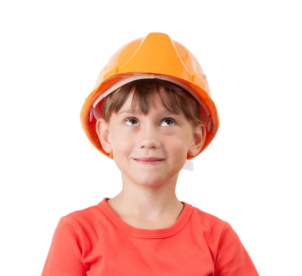 Girl in a protective helmet looking up — Stock Photo, Image