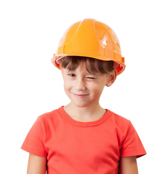 Little girl in a protective helmet winks Royalty Free Stock Images