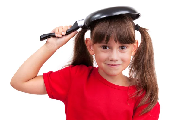 Menina segurando uma frigideira — Fotografia de Stock