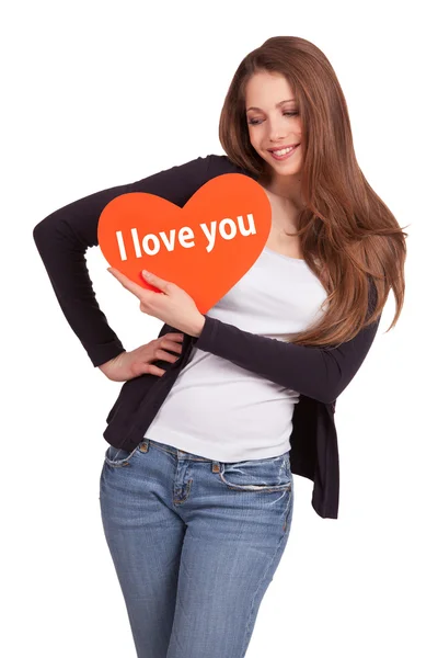 Krásná mladá žena drží srdce — Stock fotografie