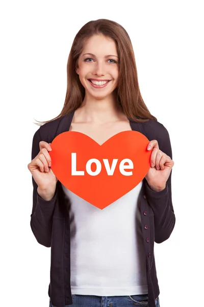 Pretty young girl holding a heart — Stock Photo, Image