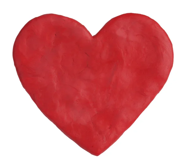 Heart, fashioned from red clay — Stock Photo, Image