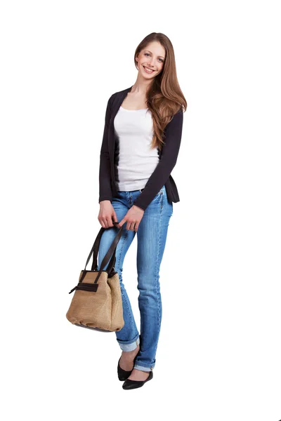 Young woman in blue jeans and pullover — Stock Photo, Image