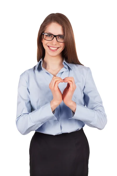 Gelukkige vrouw zetten haar handen in de vorm van hart — Stockfoto