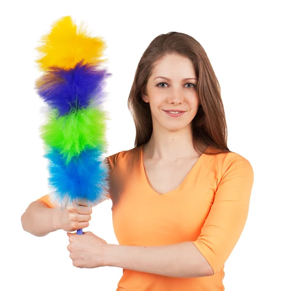 Donna con un pennello per pulire la polvere — Foto Stock