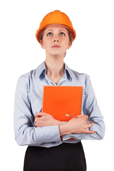 Woman in a protective helmet looking up — Stock Photo, Image