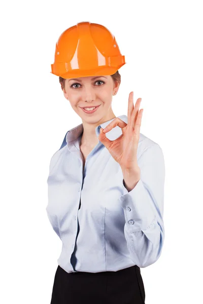 Chica en un casco muestra que todo bien — Foto de Stock