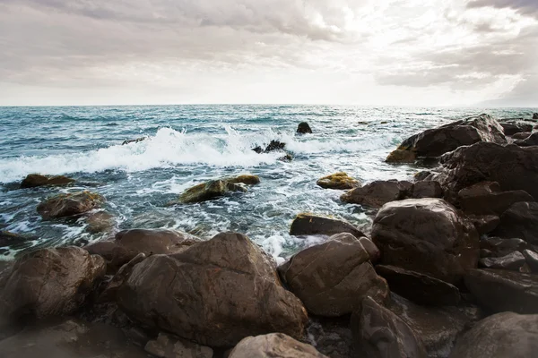 Stones on the beach washed by waves — Stock Photo, Image