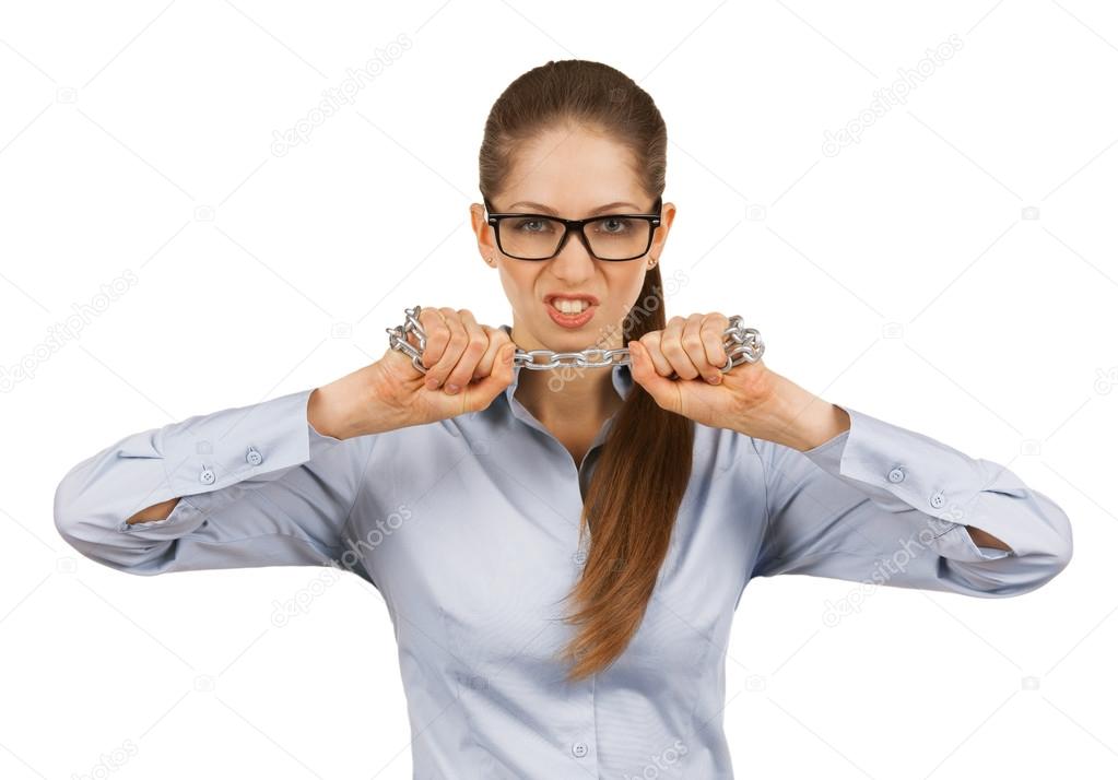 Young woman trying to break a steel chain