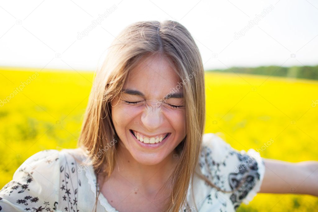 Young woman blinked from pleasure