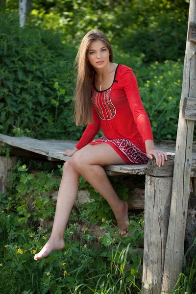 Beautiful girl in red dress — Stock Photo, Image