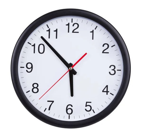 Large clock shows five to six — Stock Photo, Image