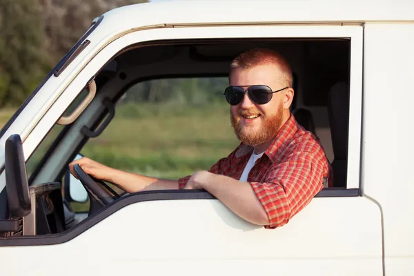 Driver of a small pickup truck — Stock Photo, Image