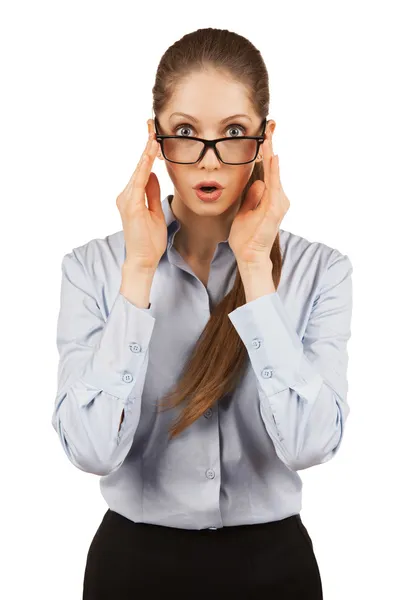 Jeune femme dans des lunettes avec quelque chose de surpris — Photo