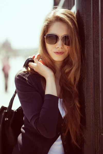 Stylish young woman in sunglasses — Stock Photo, Image