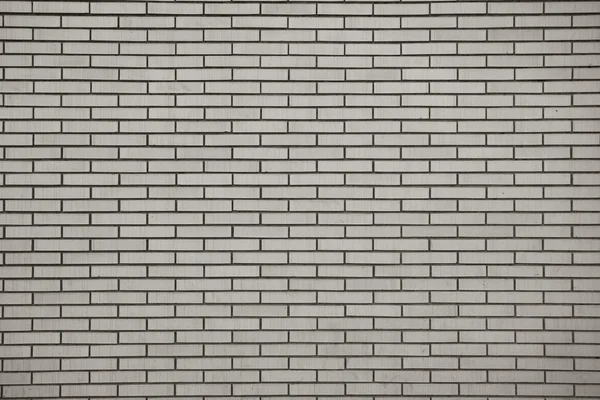 Brick wall, built of flat bricks — Stock Photo, Image