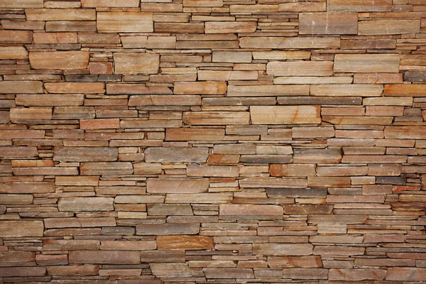 Древняя стена из плоских камней — стоковое фото