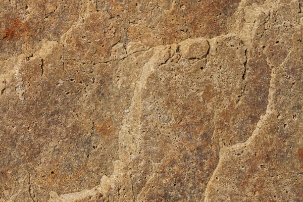 Cut stone with a lot of cracks — Stock Photo, Image