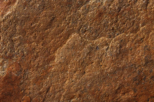 Uneven surface of brown stone — Stock Photo, Image